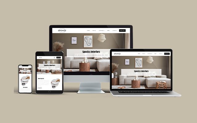 Interior website displayed across desktop, laptop, tablet and phone